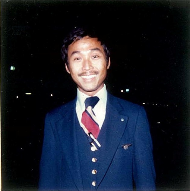 1970s Pan Am flight attendant Lu Yu outside airport terminal Guam